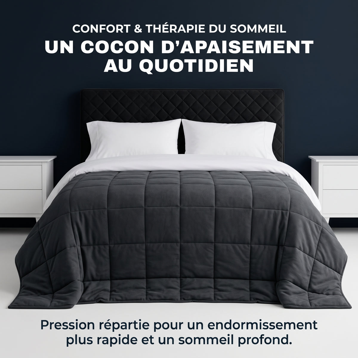 Couverture lestée Gravena carrédoux grise sur un lit avec tête de lit capitonnée noire